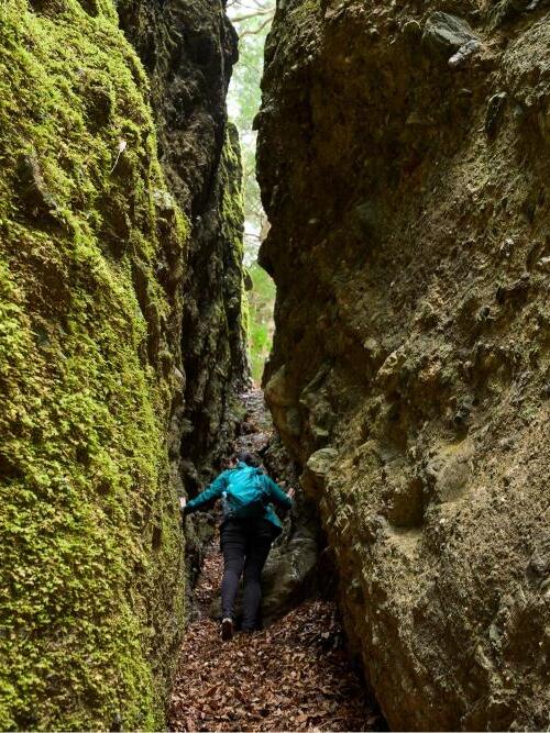 Henro trail through a narrow rock crevice on the Shikoku pilgrimage